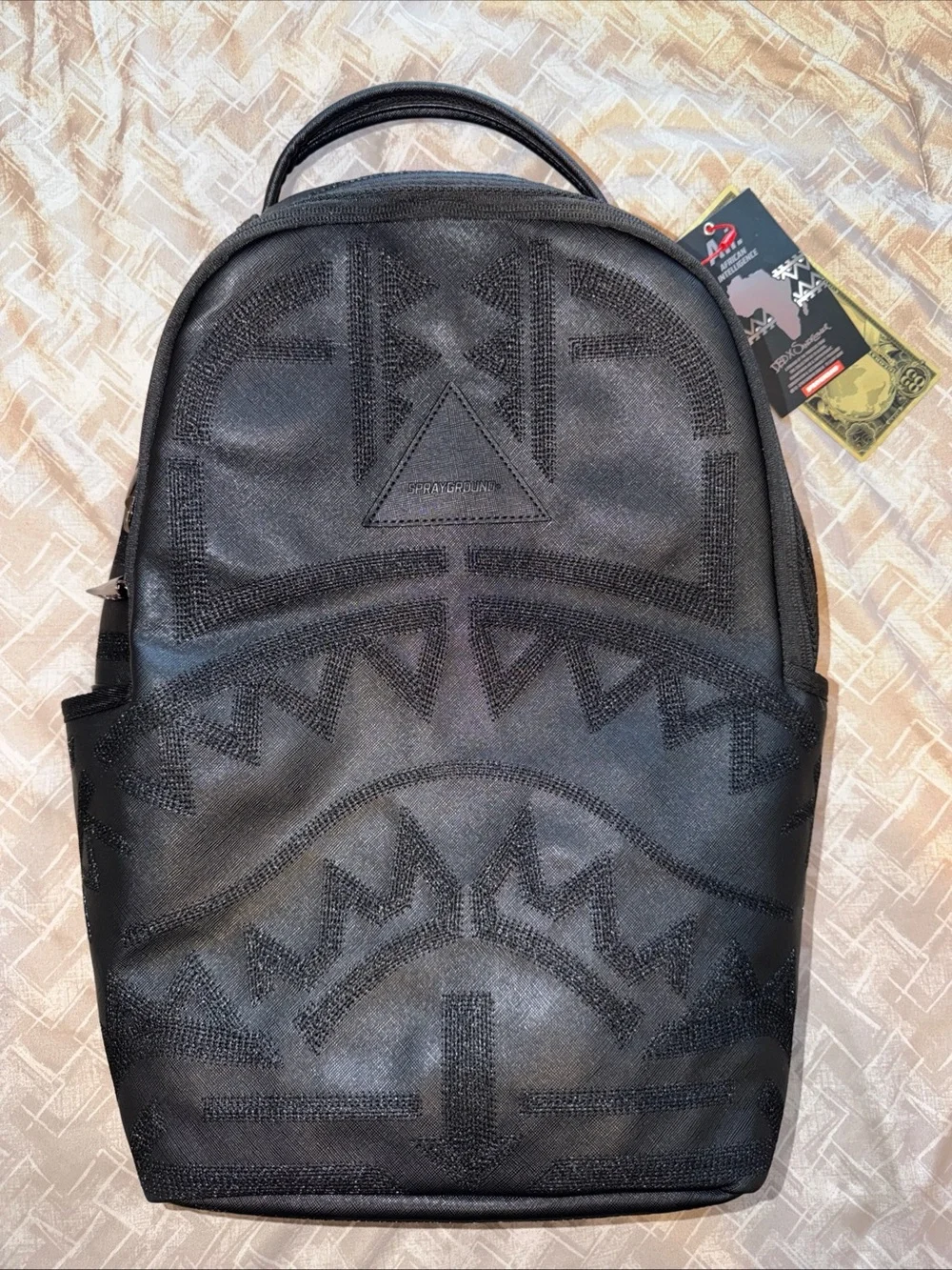 Sprayground Black Embossed African Intelligence Backpack